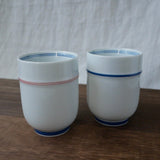 Saikai Ceramics: Red Trim, White Porcelain Yunomi Tea Cup with Blue Accents 150 ml - natsumiya.live