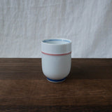 Saikai Ceramics: Red Trim, White Porcelain Yunomi Tea Cup with Blue Accents 150 ml - natsumiya.live